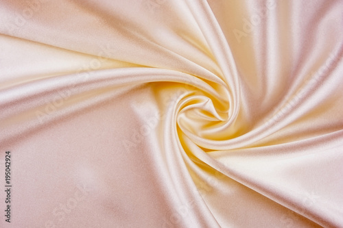 The texture of the satin fa...