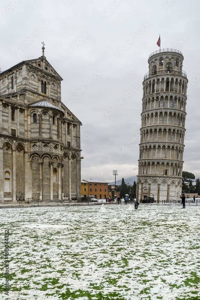 The leaning tower and Duomo after a snowfall, Piazza dei Miracoli, Pisa, Tuscany, Italy