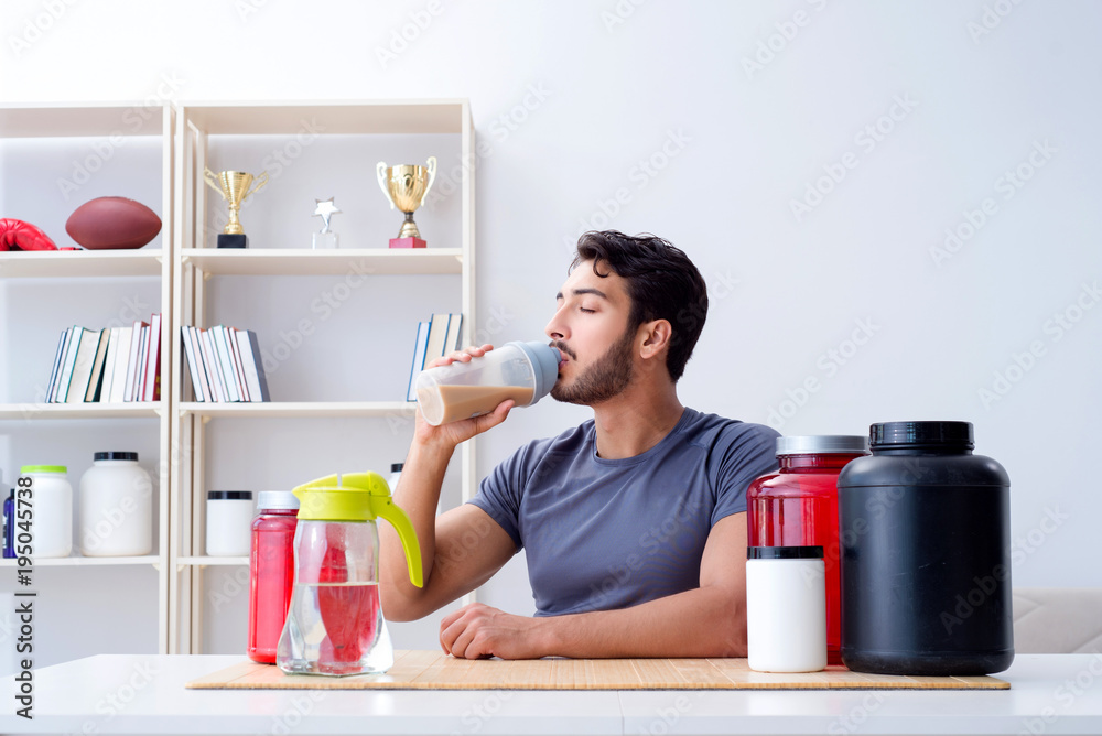 Athlete tasting new protein supplements for better muscles Athlete tasting new protein supplements for better muscles