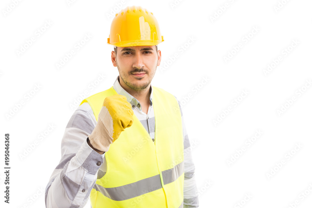 Threatening builder or worker showing fist. Threatening builder or worker showing fist.
