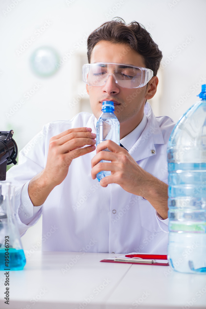 Lab assistant testing water quality Lab assistant testing water quality