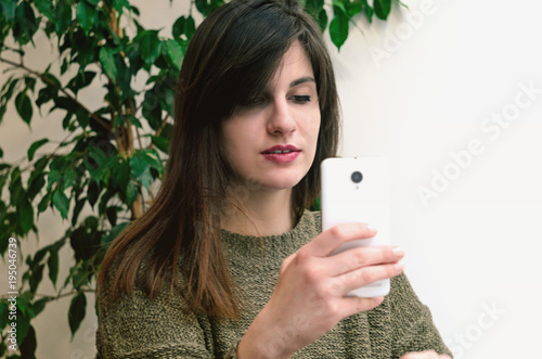 Beautifur girl using smartphone