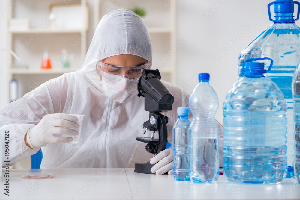 Lab assistant testing water quality Lab assistant testing water quality