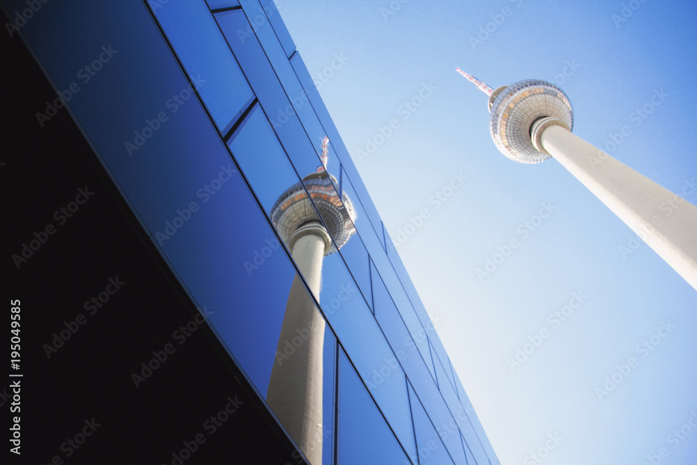 Ταπετσαρία The Berlin TV tower and its reflection in a glass building on a sunny day