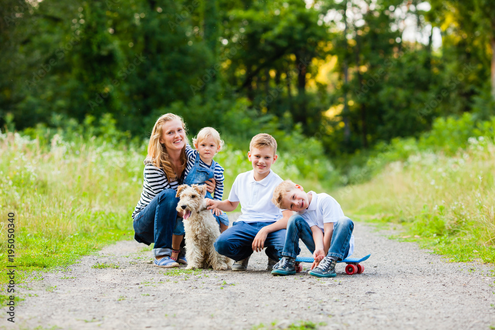 Family with fox terrier dog Family with fox terrier dog