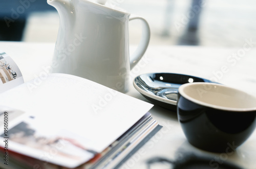 Cup of tea, book windowsill, close up