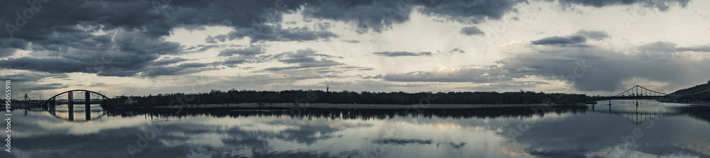 Panoramic view, two bridges construction with reflection in river Dnieper, Kiev, Ukraine. 