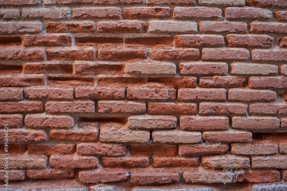 Close up of old broken brick wall for background and texture Close up of old broken brick wall for background and texture