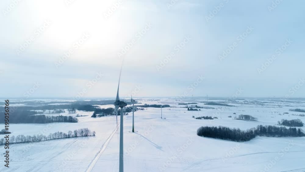 Wind Turbine Generators at Winter Time, Aerial Timelapse