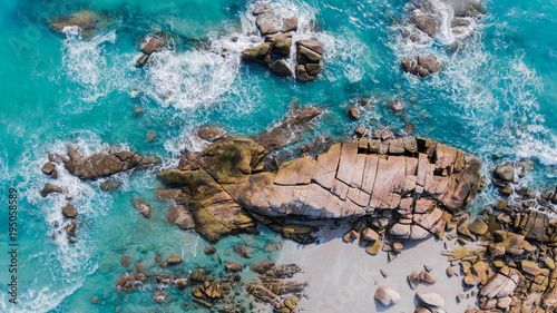 The bird eye view of sea scape and group of beach stones.
