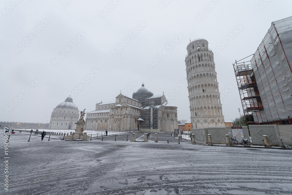 PISA, ITALY - MARCH 1, 2018: Square of Miracles with snow on a winter morning. Last snowfall had been in 2010