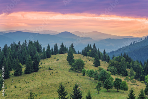 Colorful summer sunset in mountains