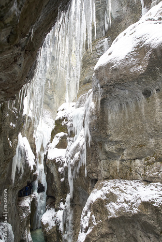 Frozen waterfall with icicles seen in the park © Andreas