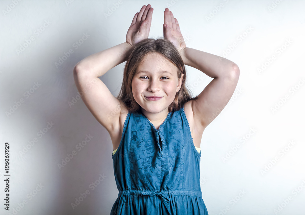 Little girl is depicting an Easter bunny. Little girl is depicting an Easter bunny.
