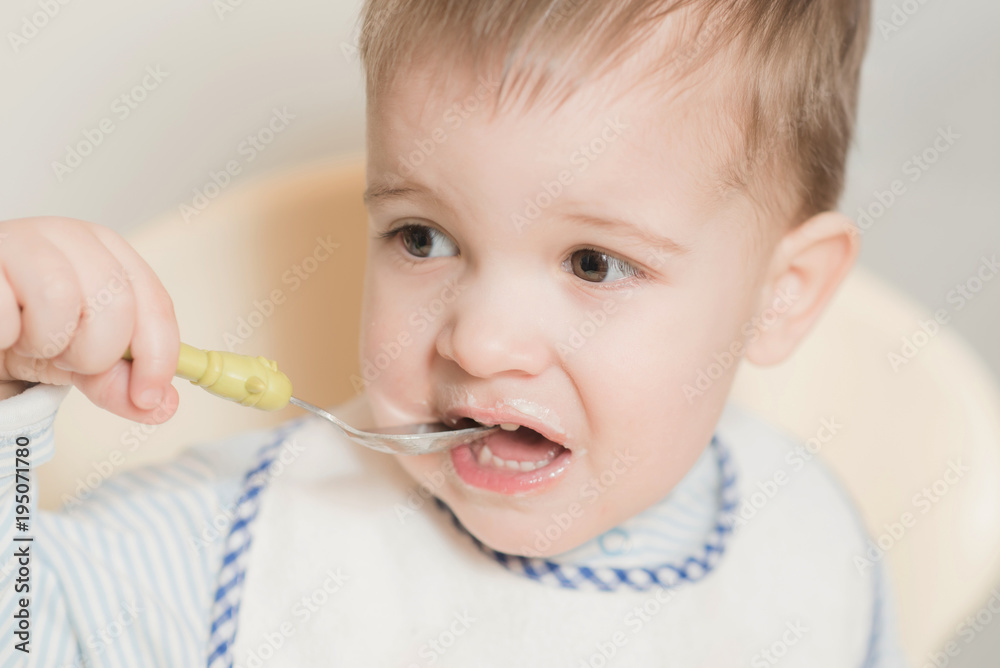 the kid in the kitchen eats milk porridge the kid in the kitchen eats milk porridge