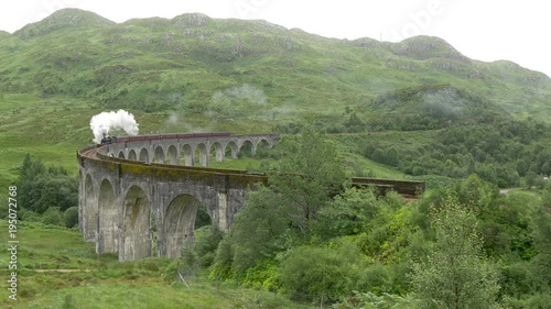 Wallpaper Mural A steam train rolling on a railway bridge Torontodigital.ca