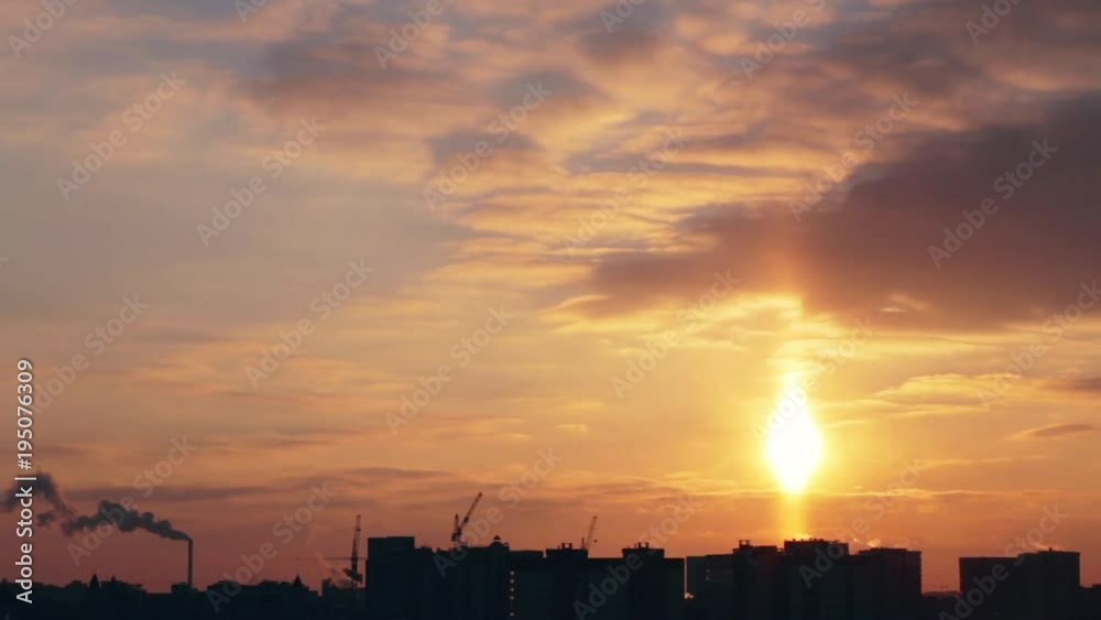 Sunset over city landscape with dramatic clouds, time lapse video Sunset over city landscape with dramatic clouds, time lapse video