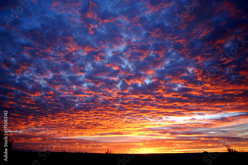 Colorful sunset in the desert badlands of Bisti/De Na Zin in Northern New Mexico
