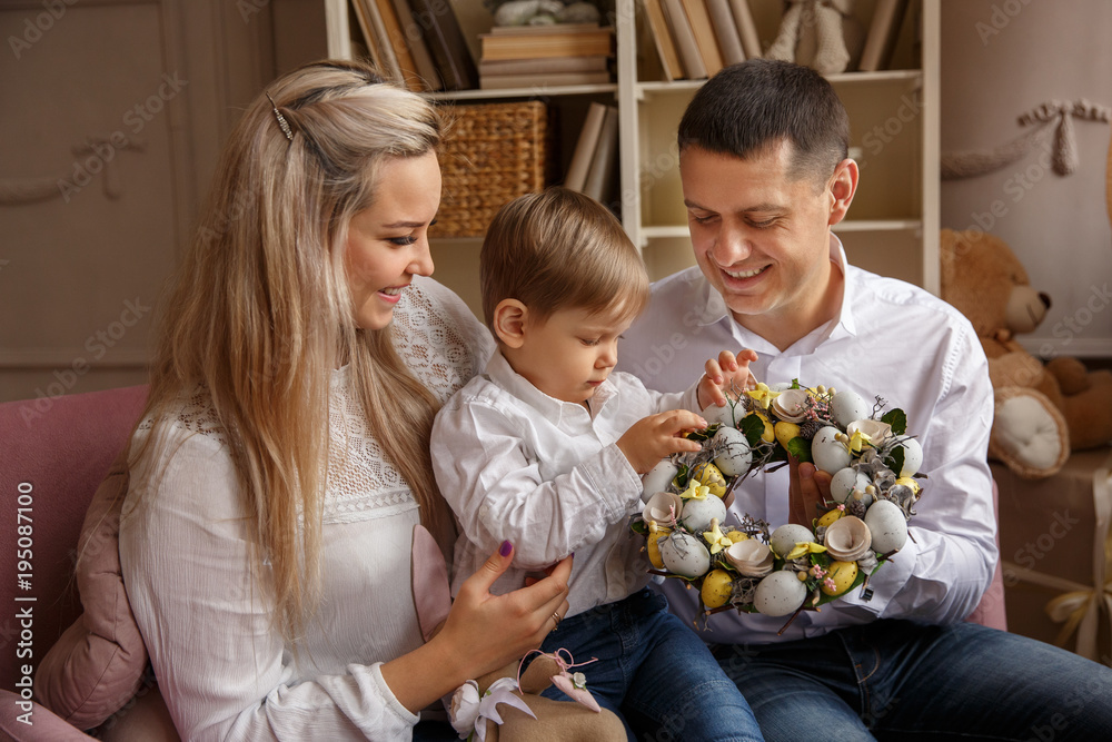 Happy Easter. Young family preparating for Easter day Happy Easter. Young family preparating for Easter day