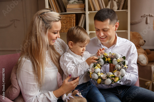 Happy Easter. Young family preparating for Easter day photo