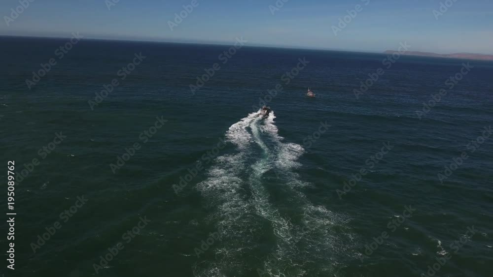 far pull away coast guard together, rough seas, rouge wave crashing over boat water, Drone aerial video, 4k, rescue, marine, pacific, tide, surge, danger, dangerous waves raw far pull away coast guard together, rough seas, rouge wave crashing over boat water, Drone aerial video, 4k, rescue, marine, pacific, tide, surge, danger, dangerous waves raw