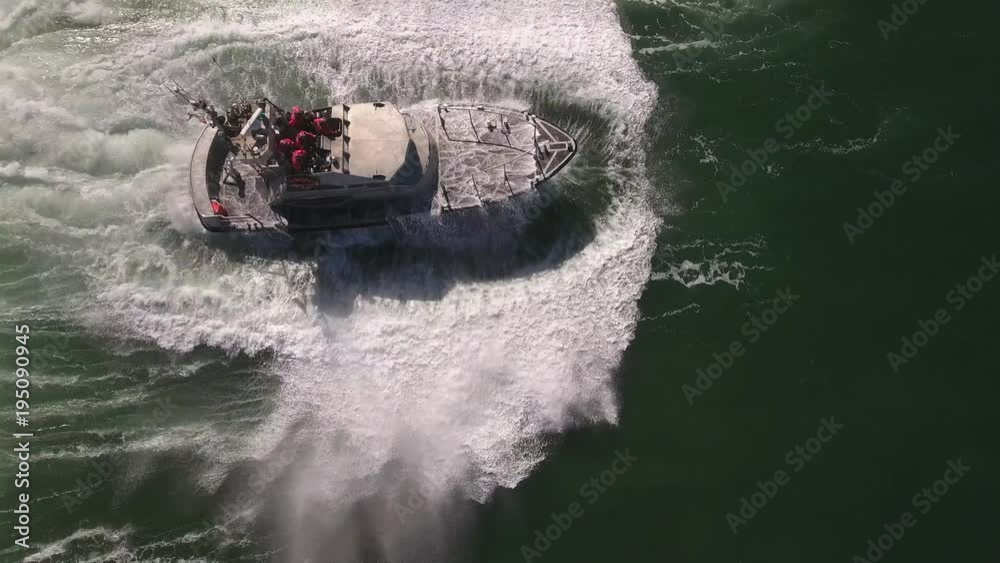 looking down epic wave over coast guard, rough seas, rouge wave crashing over boat water, Drone aerial video, 4k, rescue, marine, pacific, tide, surge, danger, dangerous waves raw