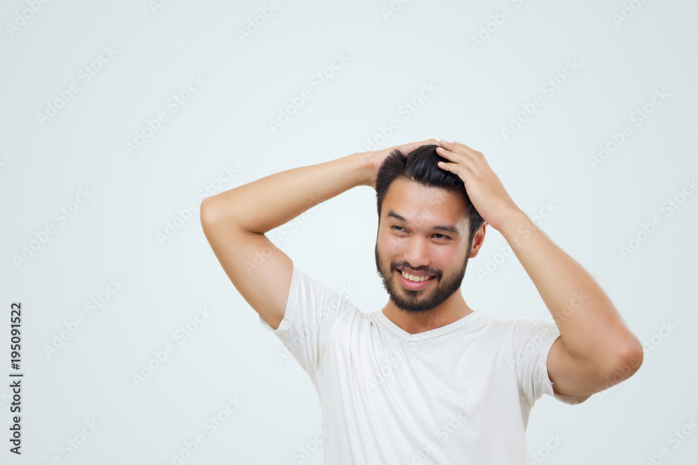 Asian handsome man with a mustache, smiling and laughing isolated on white background Asian handsome man with a mustache, smiling and laughing isolated on white background