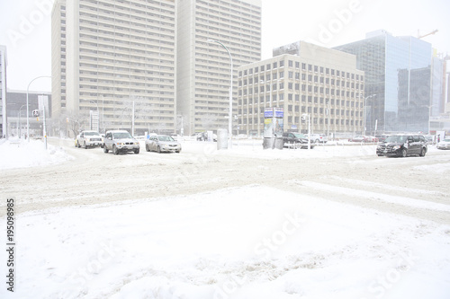 car traffic in a snow corner street