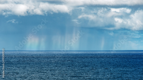 rain curtains with light rainbow colors maui hawaii