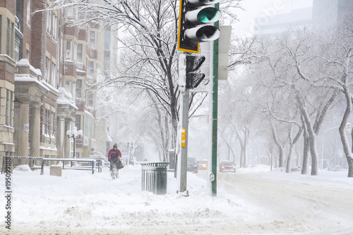 cyclist in a snow storm day