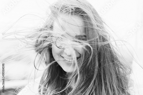 Black and white portrait poster girl beautiful flying in the wind hair face hairstyle style