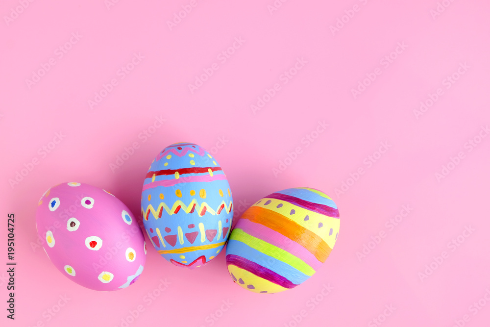 Easter eggs on pink background.Festival concept Easter eggs on pink background.Festival concept