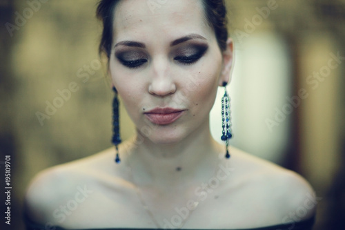 glamor portrait of a girl with makeup and cosmetics