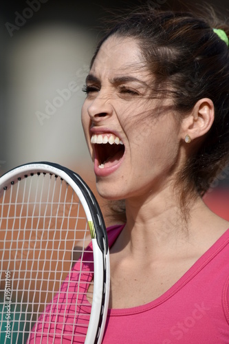 Anxious Athlete Colombian Person With Tennis Racket © dtiberio
