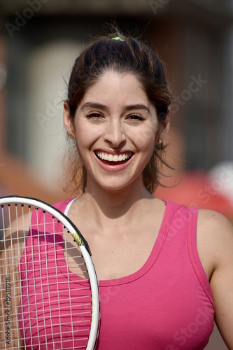 Smiling Colombian Female Tennis Player Wearing Sportswear © dtiberio