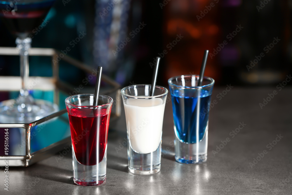 Cocktails in colors of American flag on table Cocktails in colors of American flag on table