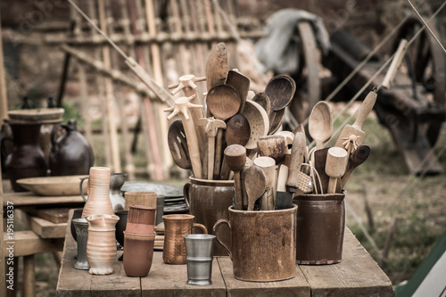 A medieval show in Germany transports visitors back in time with knights in shining armor, jousting tournaments, and vibrant market stalls. Music, fire breathers, and traditional foods create  photo