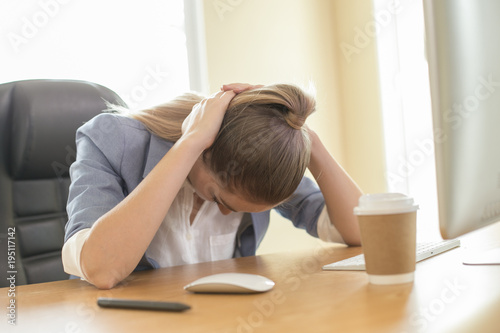 Woman working stress situation at office. People working concept. photo