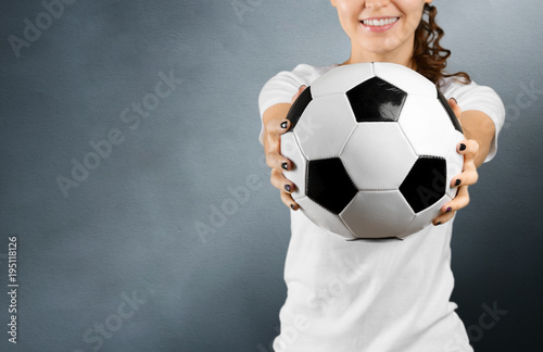Beautiful European young cheerful happy woman, football fan or player © fotofabrika