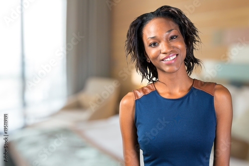 Portrait of beautiful African American businesswoman smiling Free Download Portrait of beautiful African American businesswoman smiling - GFXLoad