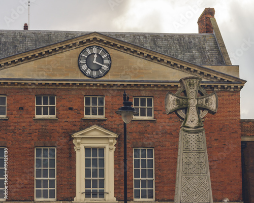 Close up of Burma Memorial with old Building in Background in Taunton Somerset England, Split Toning Shallow Depth of Field photo