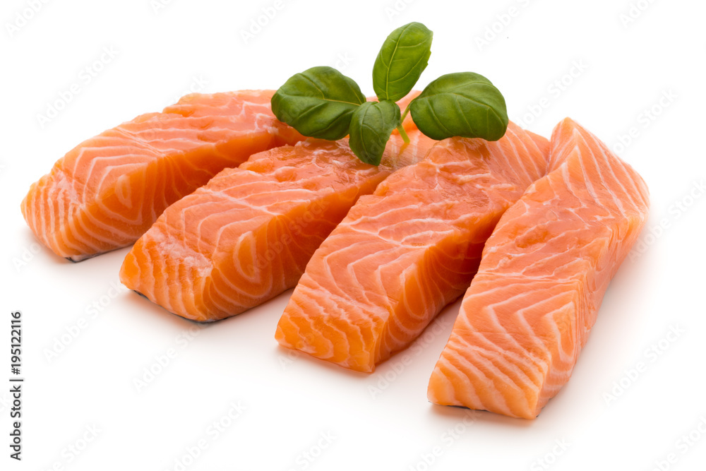 Fresh salmon fillet with basil on the white background.