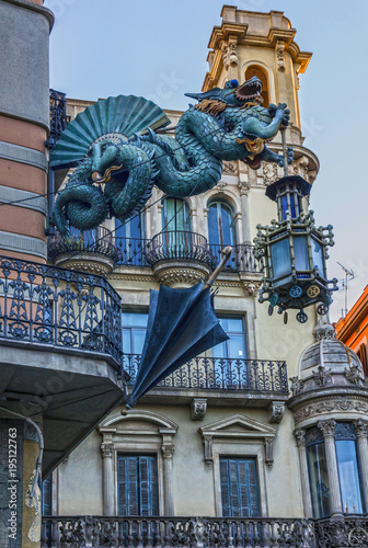 Barcelona. Chinese dragon on House of Umbrellas (Casa Bruno Cuadros) building on La Rambla. Catalonia, Spain.