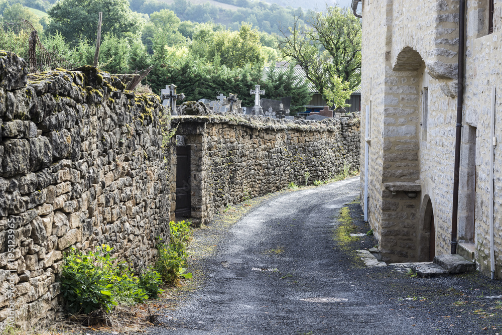 Cemetery street in the city of Auxillac in France Cemetery street in the city of Auxillac in France