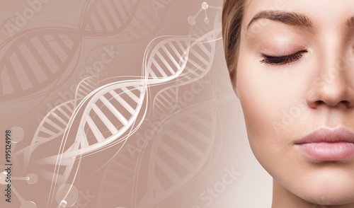 Portrait of sensual woman among white DNA chains.
