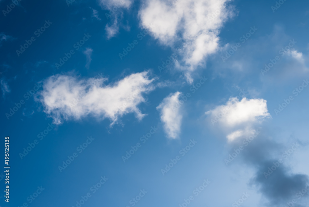 Beautiful blue sky with sparse clouds Beautiful blue sky with sparse clouds