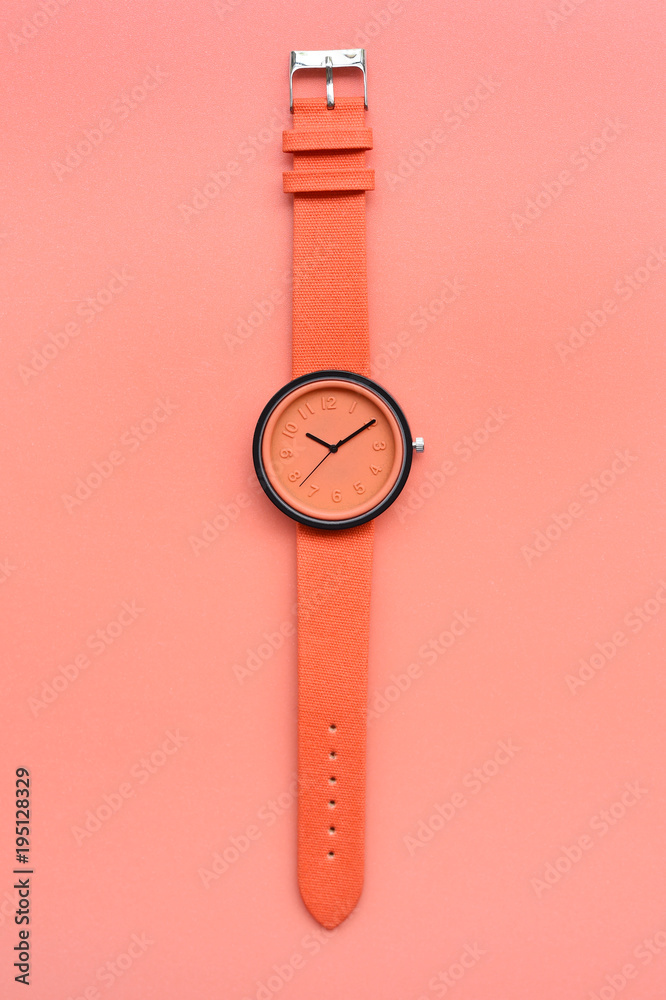 close up of orange wrist watches for background close up of orange wrist watches for background