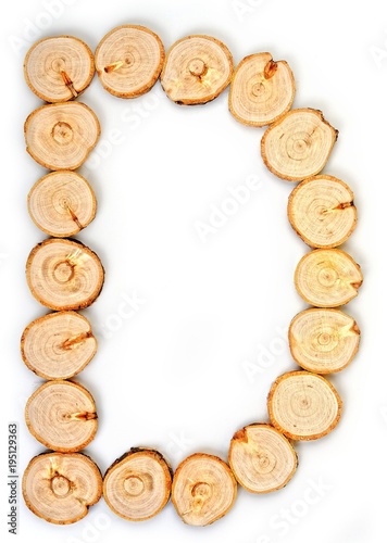 Alphabet letters made from Wood slice on white Background.D.