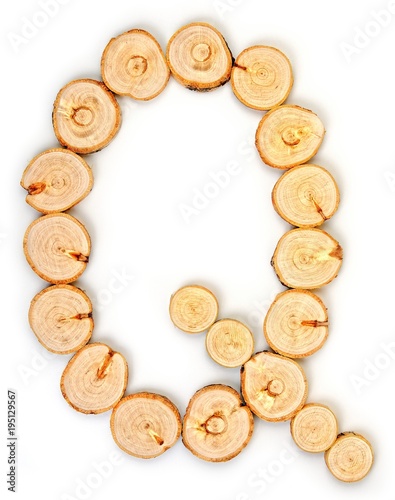 Alphabet letters made from Wood slice on white Background.Q.