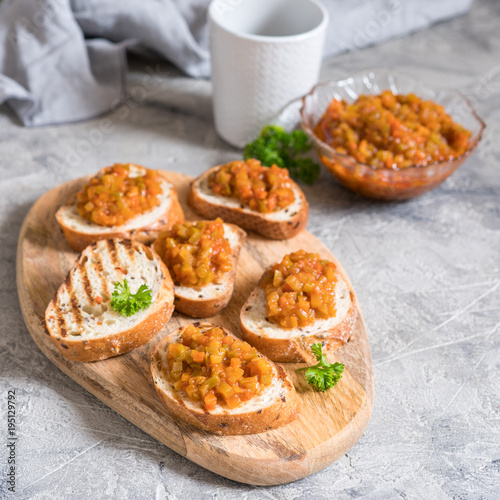 Toasted bread with vegetable caviar, made of squash, pumpkin, tomato, carrot